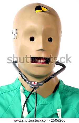 Close-up of crash test dummy in doctors scrubs - stock photo - stock-photo-close-up-of-crash-test-dummy-in-doctors-scrubs-2506200