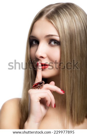 Young Girl With Finger On Lips Shushing Stock Photo 