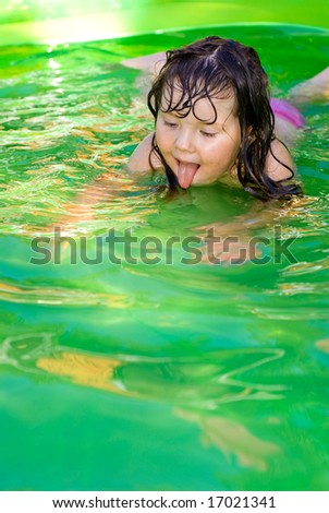 swimming in a green pool