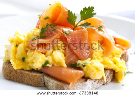 stock-photo-scrambled-eggs-with-smoked-salmon-on-sourdough-toast-67338148.jpg