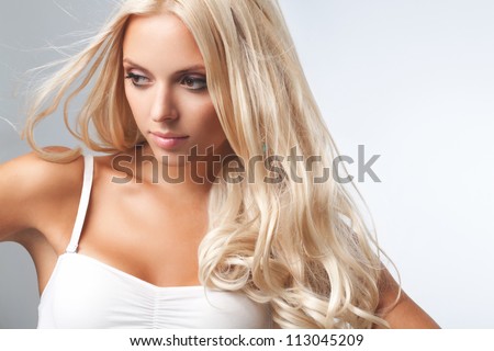 http://thumb7.shutterstock.com/display_pic_with_logo/614404/113045209/stock-photo-portrait-of-beautiful-blonde-woman-healthy-long-blond-hair-hair-extension-113045209.jpg