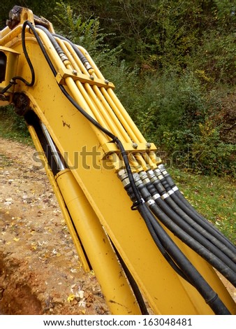 stock-photo-hydraulic-pipes-and-hoses-on-the-arm-of-an-excavator-163048481.jpg