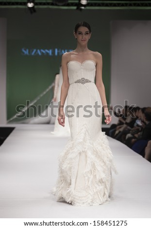  - stock-photo-new-york-october-model-walks-runway-for-suzanne-harward-during-bridal-week-at-pier-on-158451275