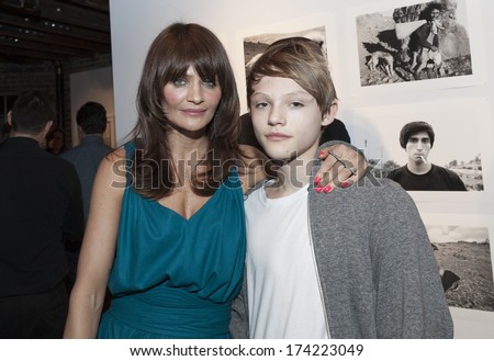  - stock-photo-new-york-ny-january-helena-christensen-son-attend-luxury-collection-hotels-resorts-174223049