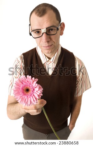 http://thumb7.shutterstock.com/display_pic_with_logo/65211/65211,1232935046,1/stock-photo-nerdy-guy-offering-a-flower-23880658.jpg