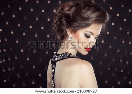http://thumb7.shutterstock.com/display_pic_with_logo/662170/210398929/stock-photo-elegant-brunette-woman-lady-with-makeup-and-hairstyle-fashion-girl-model-over-bokeh-lights-210398929.jpg