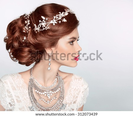 Wedding Hairstyle. Beautiful fashion bride girl model portrait. Luxury 