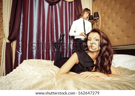 http://thumb7.shutterstock.com/display_pic_with_logo/67164/162647279/stock-photo-sexy-young-couple-playing-in-love-games-in-a-bedroom-162647279.jpg
