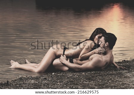 stock-photo-young-sexy-couple-on-beach-t