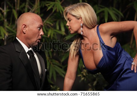 http://thumb7.shutterstock.com/display_pic_with_logo/68697/68697,1298247773,1/stock-photo-man-looking-at-the-woman-s-cleavage-71655865.jpg