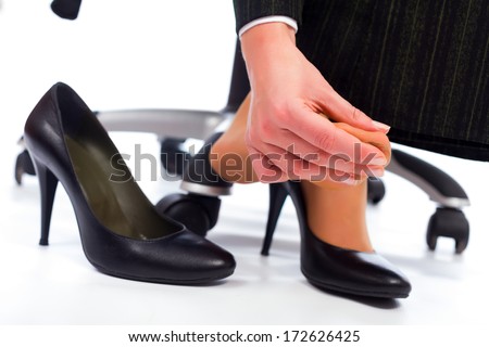 Wearing high heel shoes has its painful disadvantages - hurting feet ...
