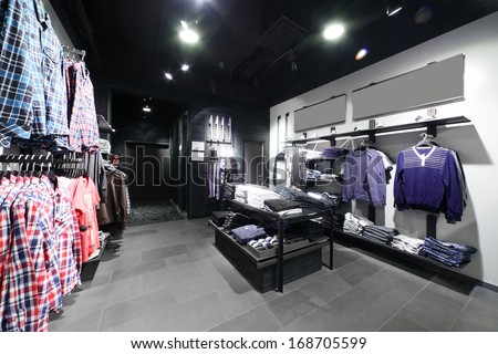 european clothing store interior in modern mall - stock photo