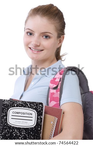 Friendly Caucasian High school girl student standing with backpack and holding books, notebooks and composition - stock-photo-friendly-caucasian-high-school-girl-student-standing-with-backpack-and-holding-books-notebooks-and-74564422