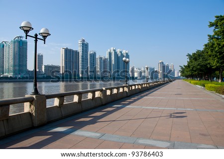 The Pearl river, sightseeing walkway and cityscape of the Guangzhou 