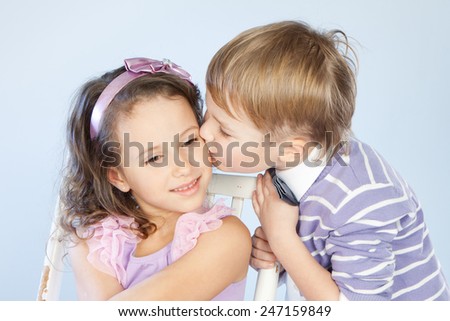 Little boy kissing b