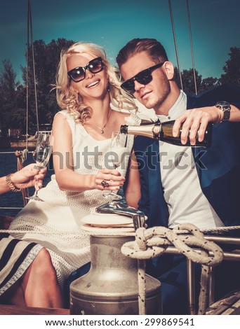 stock photo stylish wealthy couple on a luxury yacht 299869541