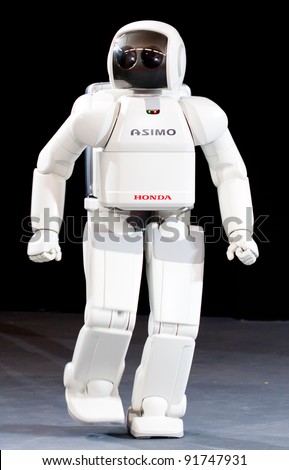 Asimo a humanoid robot created by honda #7