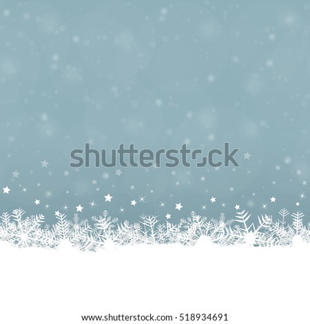 white snow flakes on bottom side and blue colored background white snow flakes on bottom side and blue colored background