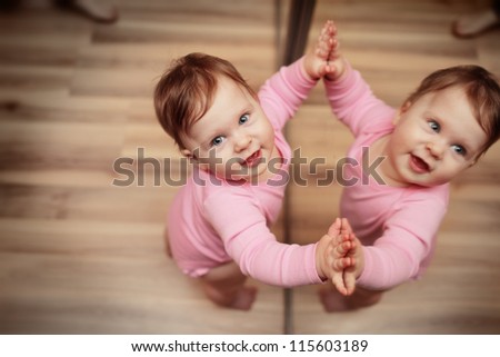 stock-photo-happy-one-year-old-baby-girl