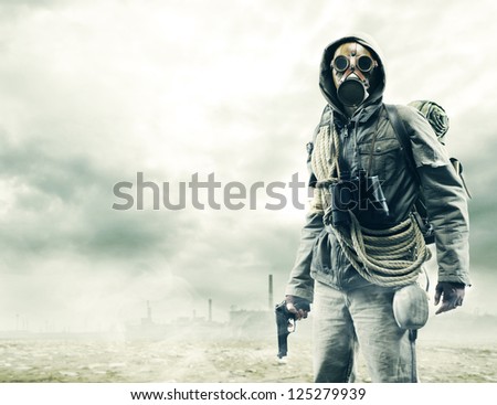 stock-photo-environmental-disaster-post-apocalyptic-survivor-in-gas-mask-125279939.jpg