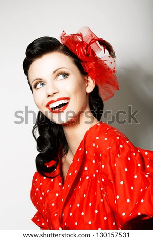 http://thumb7.shutterstock.com/display_pic_with_logo/900991/130157531/stock-photo-retro-style-elation-portrait-of-happy-toothy-smiling-woman-in-pin-up-red-dress-130157531.jpg