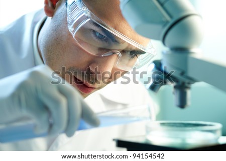 stock-photo-serious-clinician-studying-c