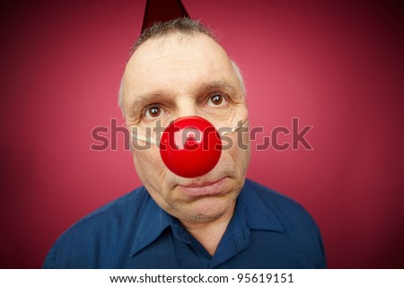 Portrait of unhappy man with a <b>red nose</b> celebrating all fools day - stock ... - stock-photo-portrait-of-unhappy-man-with-a-red-nose-celebrating-all-fools-day-95619151