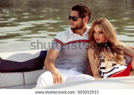 http://thumb7.shutterstock.com/display_pic_with_logo/980267/305012915/stock-photo-sexy-couple-on-the-luxury-boat-305012915.jpg