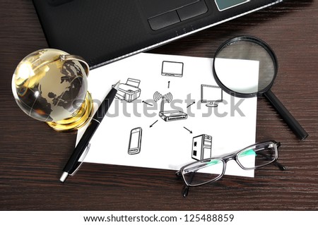 Note computer network on table businessman - stock photo