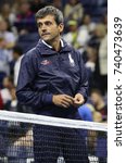 Small photo of NEW YORK - AUGUST 28, 2017: Tennis umpire Carlos Ramos of Portugal before 2017 US Open first round match at Billie Jean King National Tennis Center
