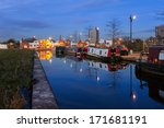 boat houses moored in a canal...