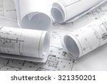 Small photo of Architect rolls and plans.architectural plan,technical project drawing