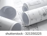 Small photo of Architect rolls and plans.architectural plan,technical project drawing