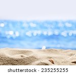sand with blurred sea...