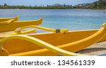 group of outrigger canoes at...