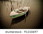 old fishing boat in lake