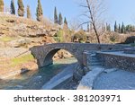 Small photo of PODGORICA, MONTENEGRO - JANUARY 23, 2016: Old stone arch bridge on Sastavci over Ribnica River in Podgorica, Montenegro. Popular hangout of lovers, gathering place of young