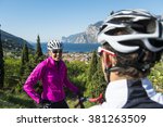 Small photo of cycling girl and boy make a break