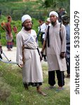 Small photo of Negeri Sembilan, Malaysia - 14th December 2014 : A group of malay men dressed in a traditional malay warrior armed with bow, arrow and keris during an event Temasya Zaman Kegemilangan Empayar Melayu