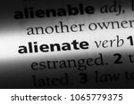 Small photo of alienate word in a dictionary. alienate concept.