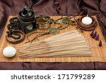 Small photo of Still life with spices, Buddhist accessories, Indian spices, Vedic jewelry, Set for relaxation