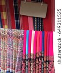 Small photo of Colorful Scarves in rural market