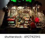 Small photo of Trinket stall. Junk jewelry items for sale.