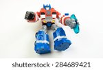 Small photo of Kuala Lumpur, Malaysia - June 6, 2015: Figure toy of Playskool Optimus Prime from the Autobots Rescue Bots cartoon. Optimus Prime is Autobots Transformers leader on Earth within Fire Station Prime