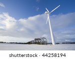 wind turbine in snow filled...