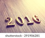 2016 on old wood background