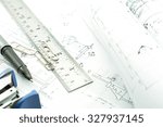 Small photo of Architect rolls and plans.architectural plan,technical project drawing