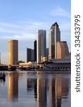 Small photo of Tampa Skyline, Water front view, modern skyscrapers in business downtown reflecting in the Hillsborough river