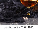 Small photo of eductive black lingerie at table background
