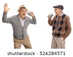 stock-photo-cheerful-seniors-telling-jokes-to-each-other-through-a-tin-can-phone-isolated-on-white-background-526284571.jpg